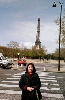 In front of the Eiffel Tower.