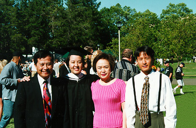 My family and me at my graduation ceremony in 1997